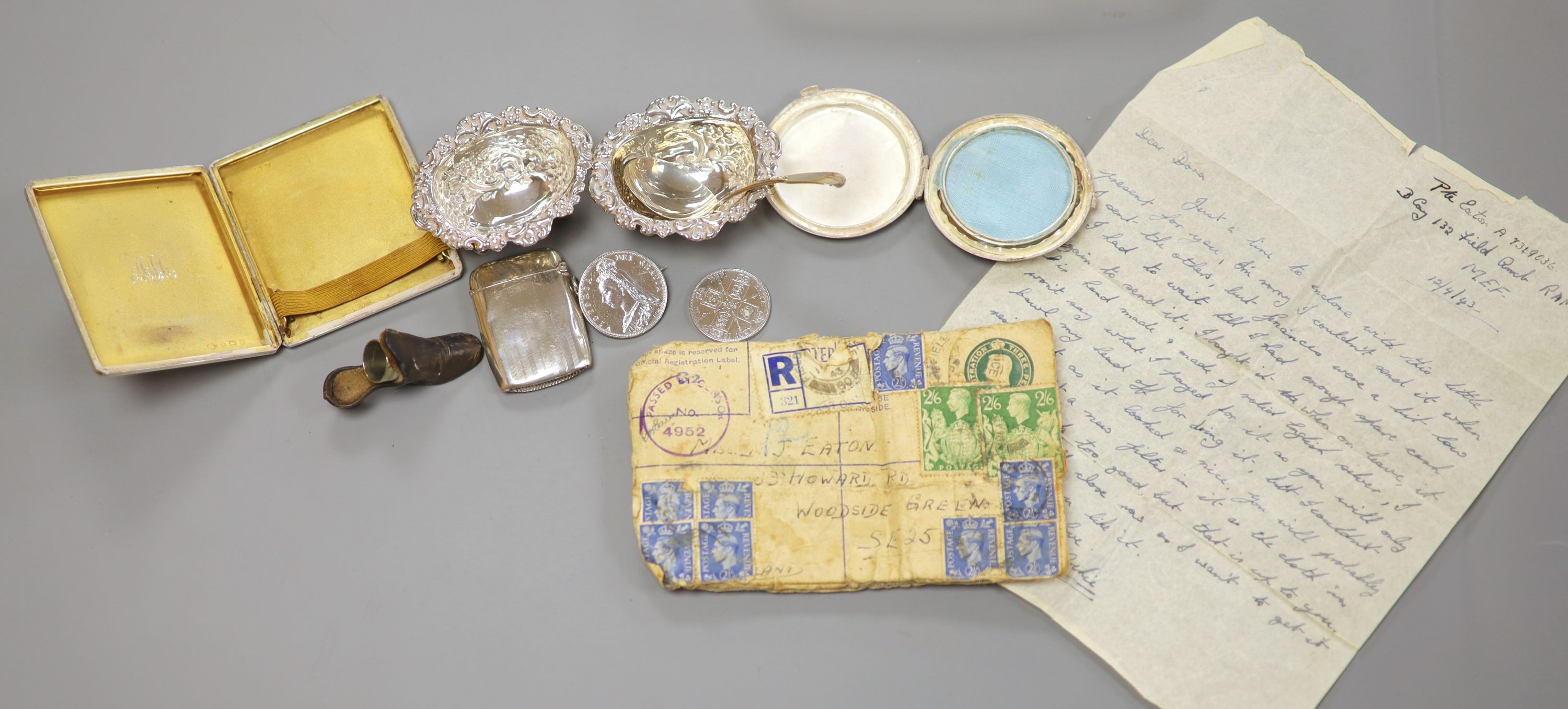 A silver cigarette case, Georgian silver caddy spoon, London, 1817, a pair of silver salts, etc.